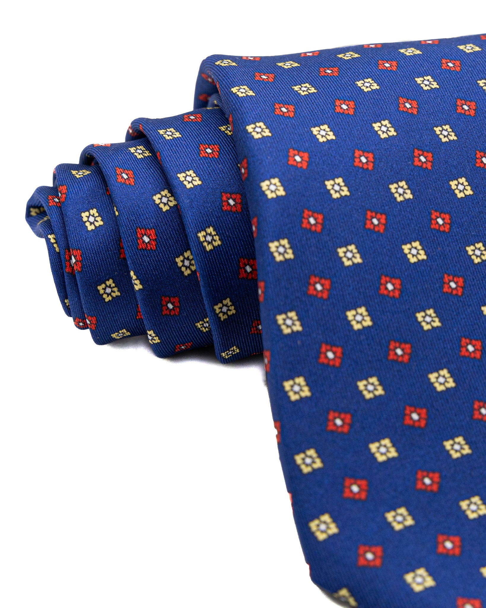 Cravate - sept plis en soie motif floral bleu marine