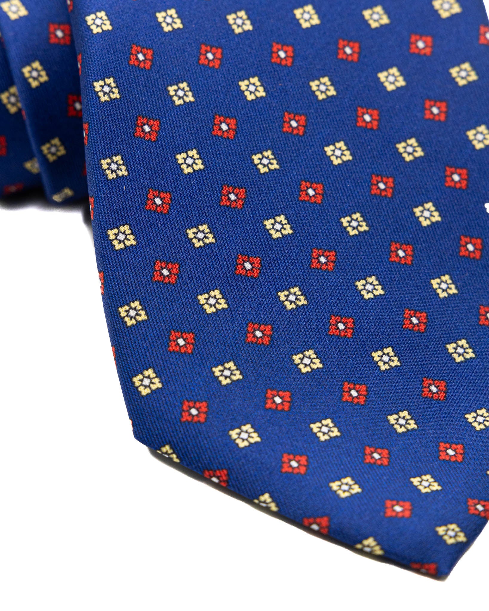 Cravate - sept plis en soie motif floral bleu marine