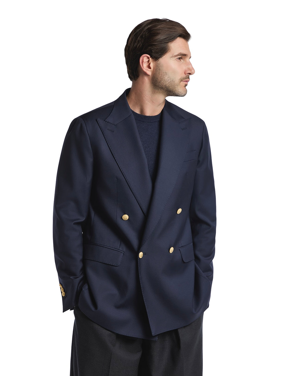 Navy double-breasted blazer featuring gold buttons, tailored fit, and elegant lapels for a sophisticated look.
