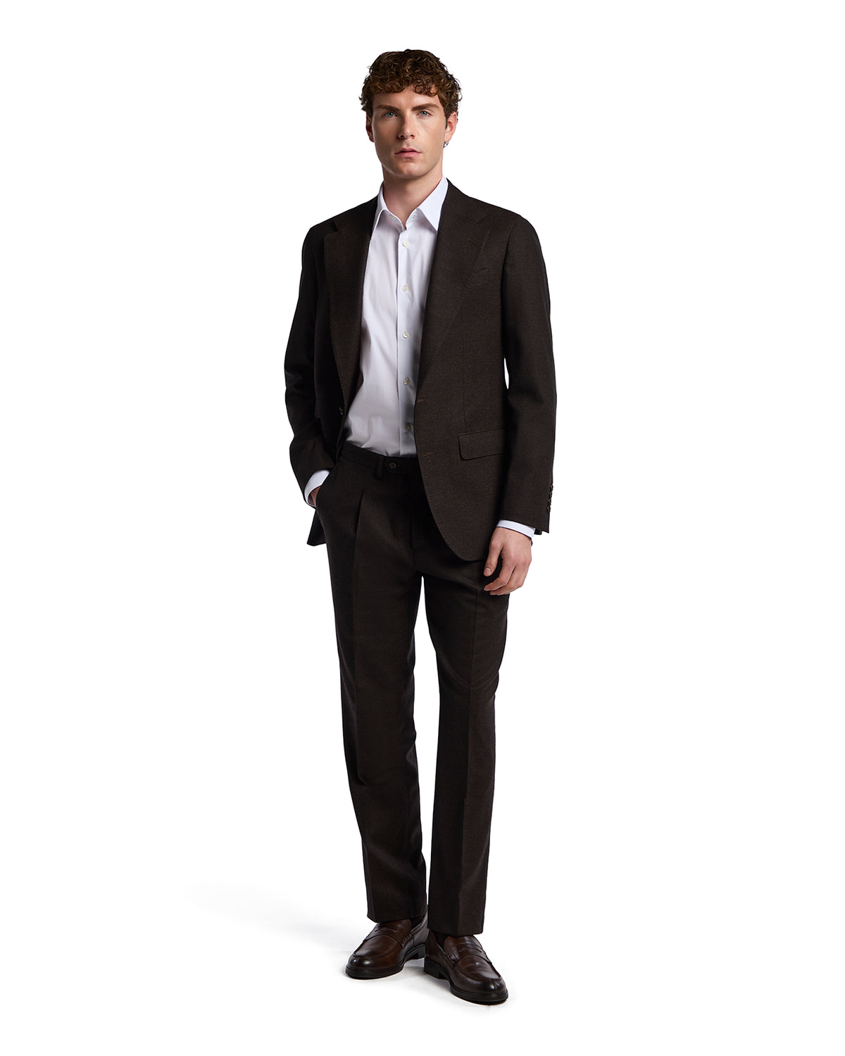 Stylish men's brown suit with a tailored fit and white dress shirt, perfect for formal occasions.